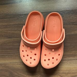 Orange classic platform crocs